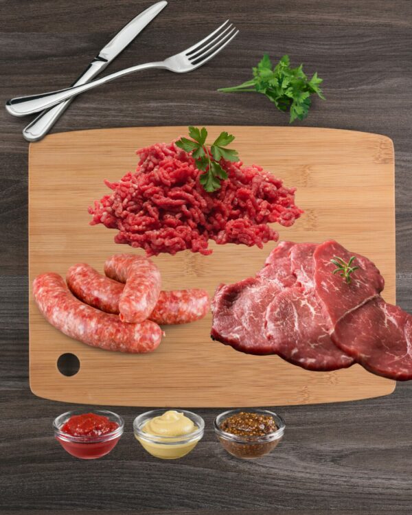 BBQ Pack displays Mince Beef Sausages Steak on chopping board with condiments