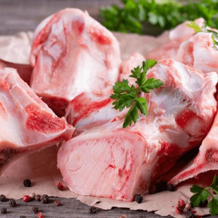 Pet Food Off-Cut Beef Bones displayed with garnish